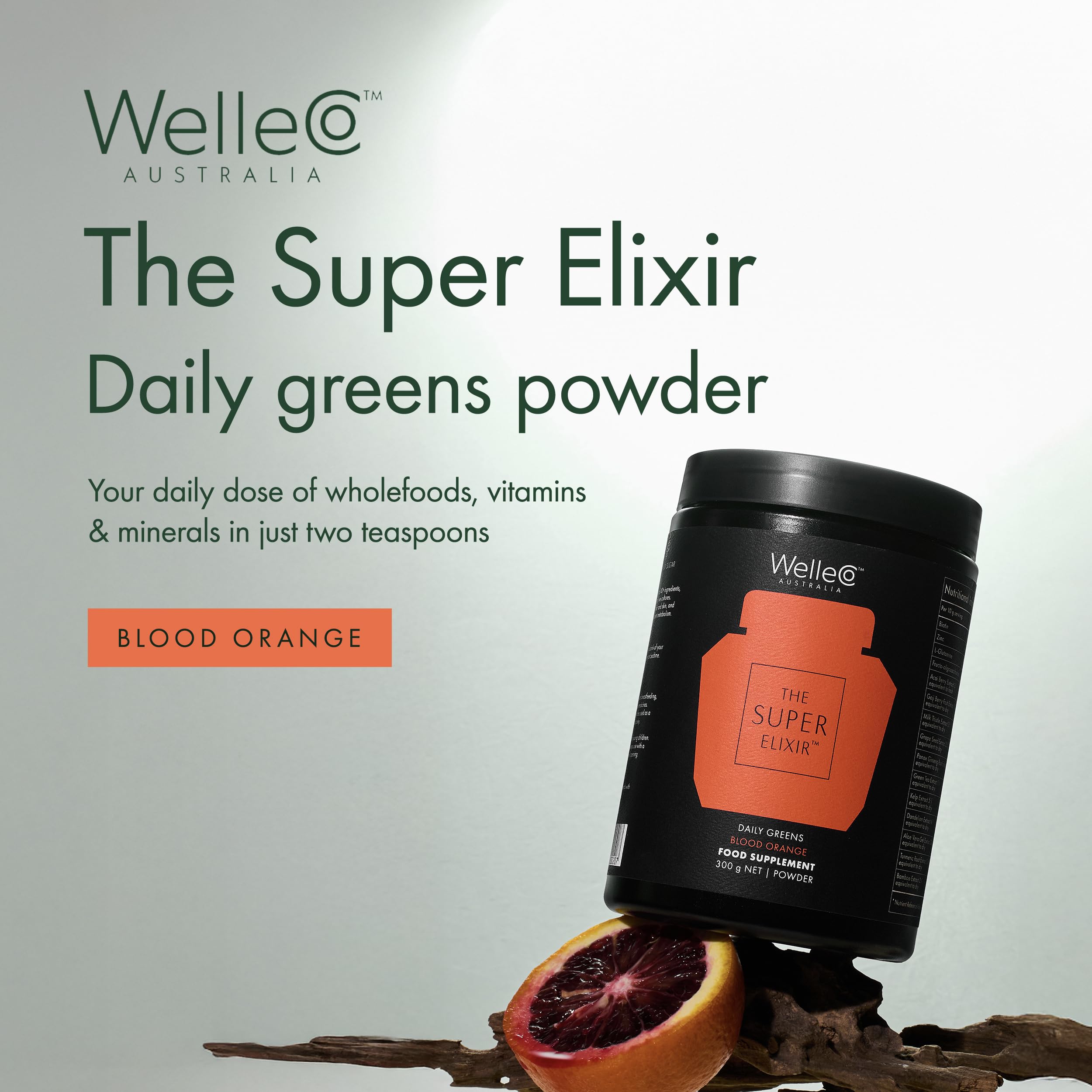Pouring WelleCo The Super Elixir powder from a bottle into a glass for morning energy