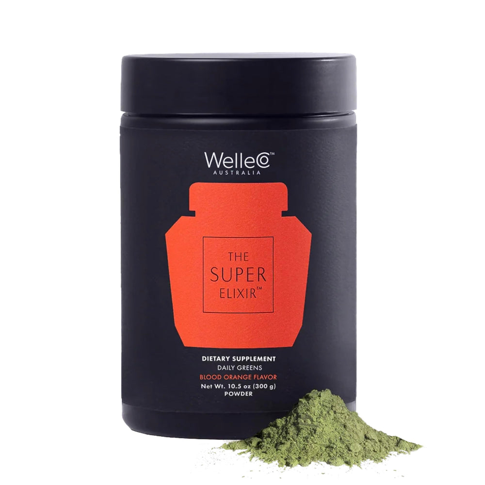 WelleCo The Super Elixir jar opened showing gluten-free vegan greens powder for daily wellness