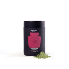 WelleCo powder scoop shown with the daily greens mix