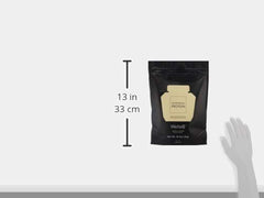 WelleCo vanilla protein bag with a measuring cup ready to mix