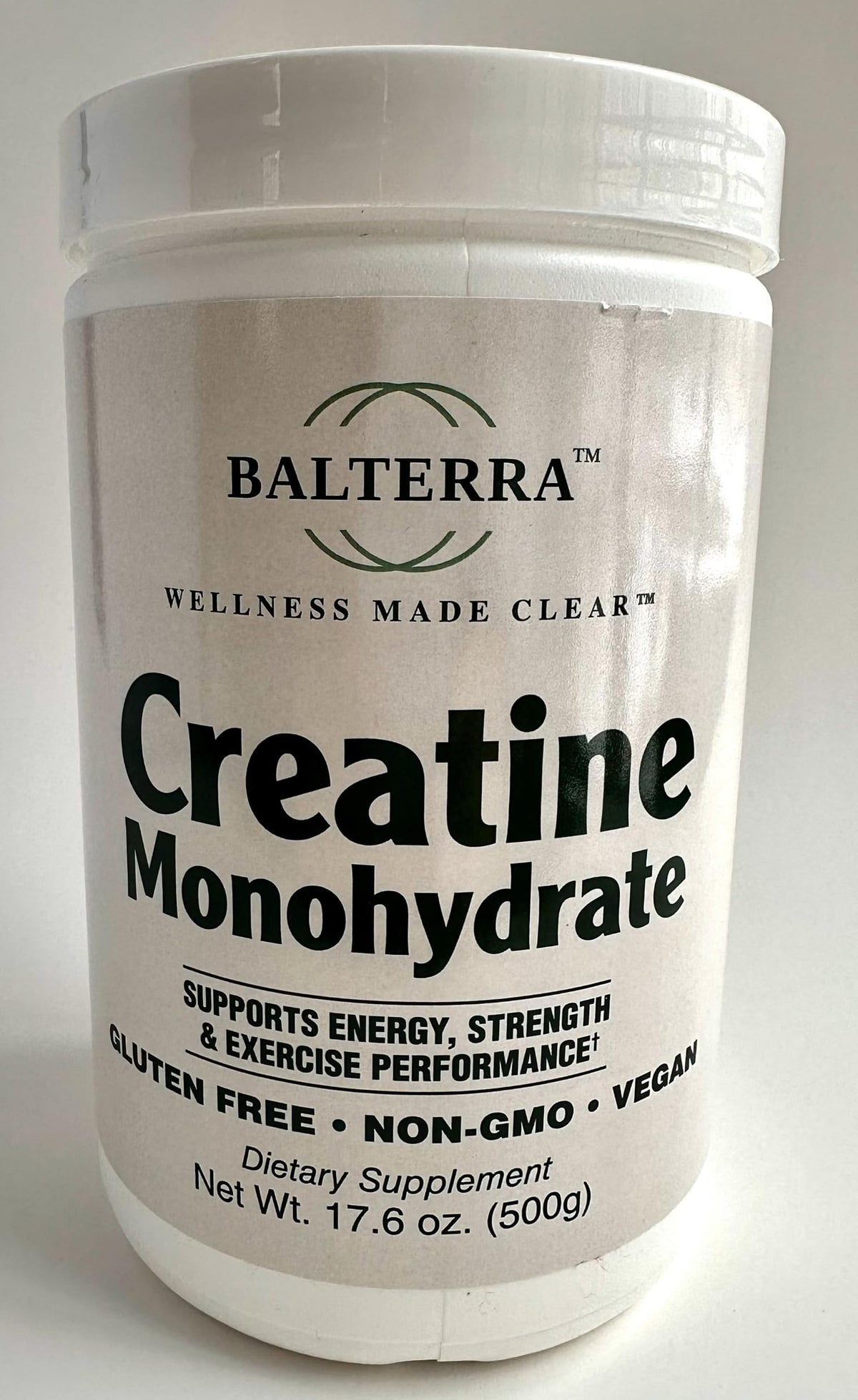 Wellness Made Clear Balterra creatine monohydrate jar with pure unflavored powder for easy mixing.