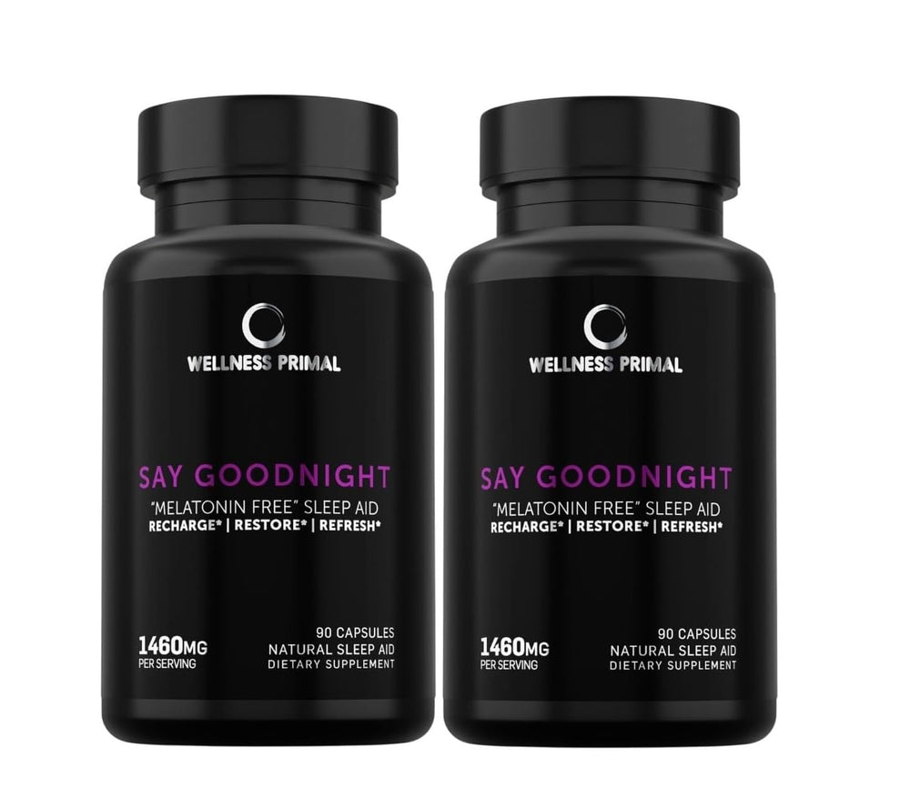 Wellnes Primal melatonin-free sleep aid bottle on a nightstand showing the product and label