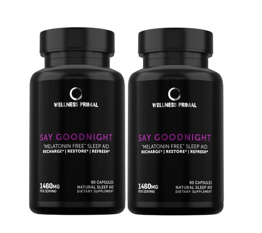 Wellnes Primal melatonin-free sleep aid bottle on a nightstand showing the product and label