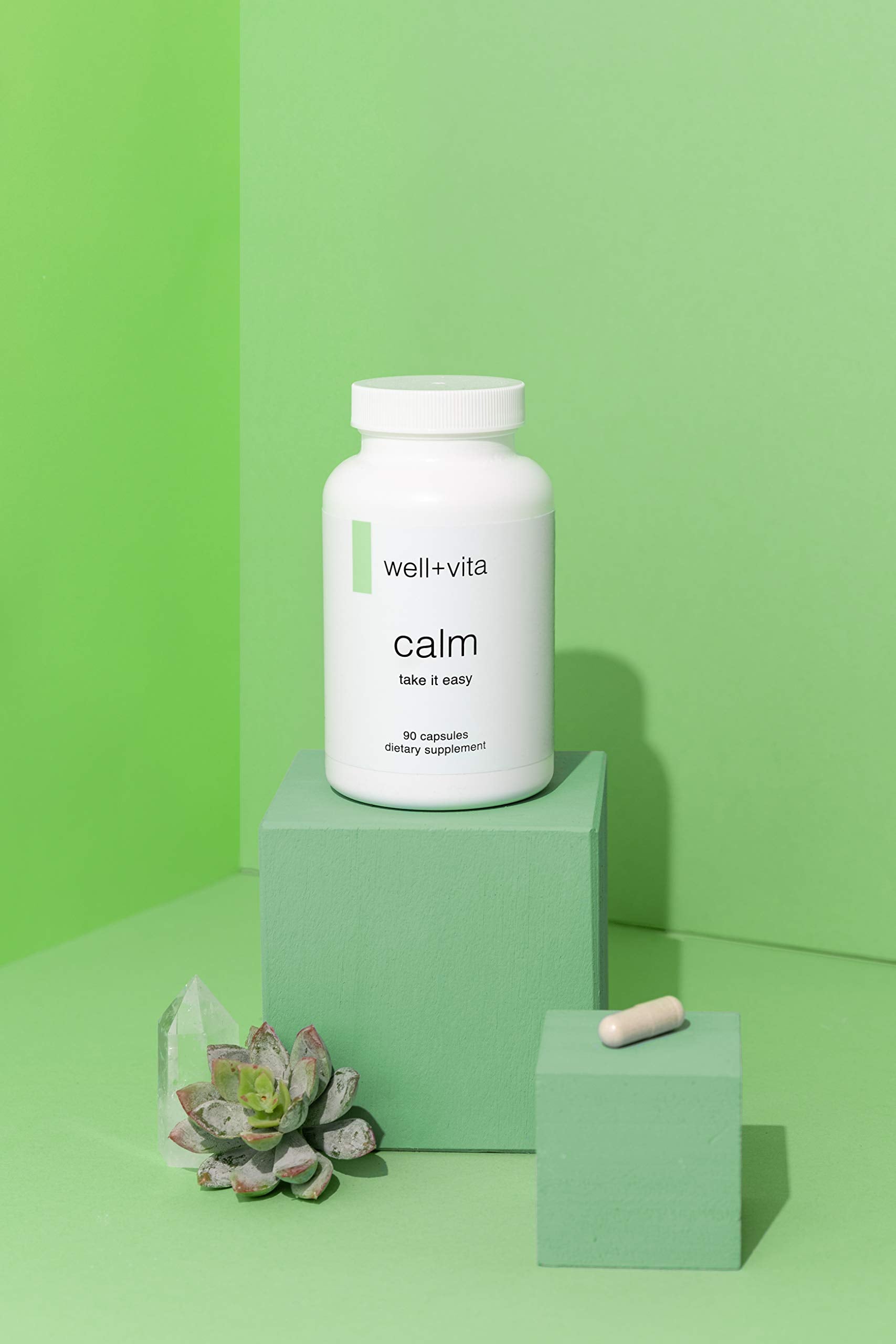 Well+Vita Calm label detail; clear dosage and vegan, non-GMO notes.
