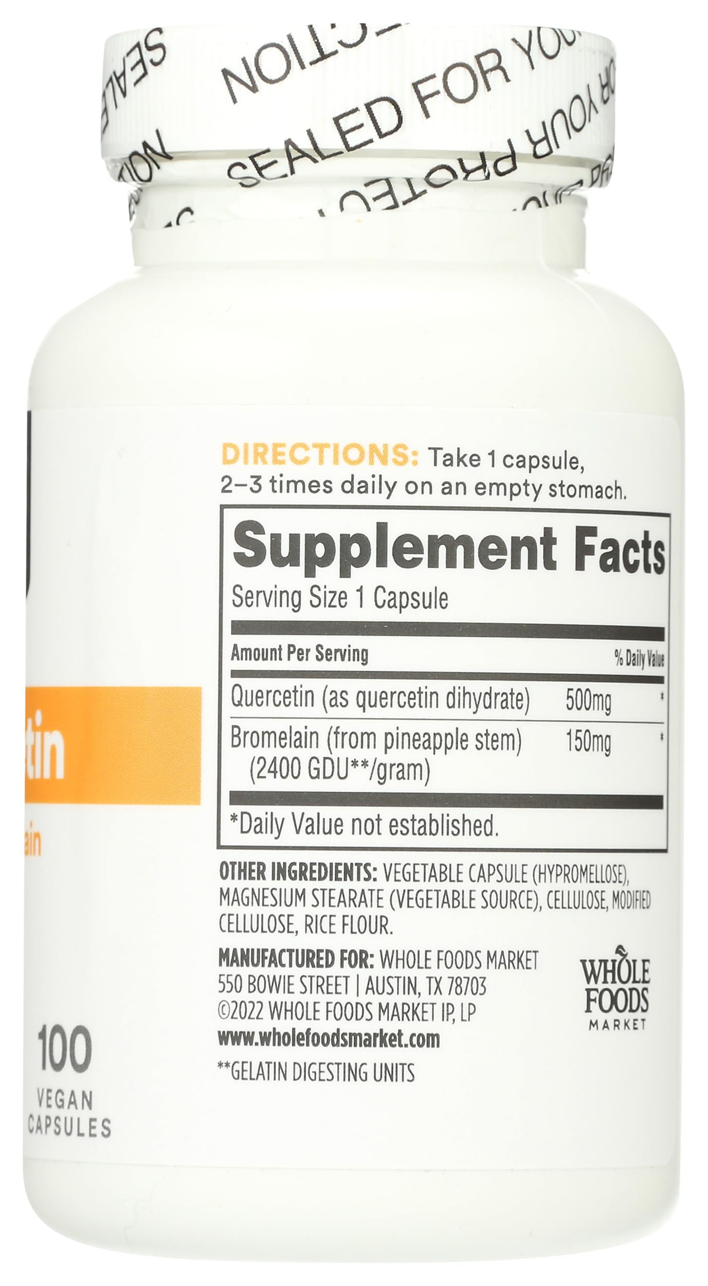 Bottle on shelf featuring Whole Foods Market supplement line