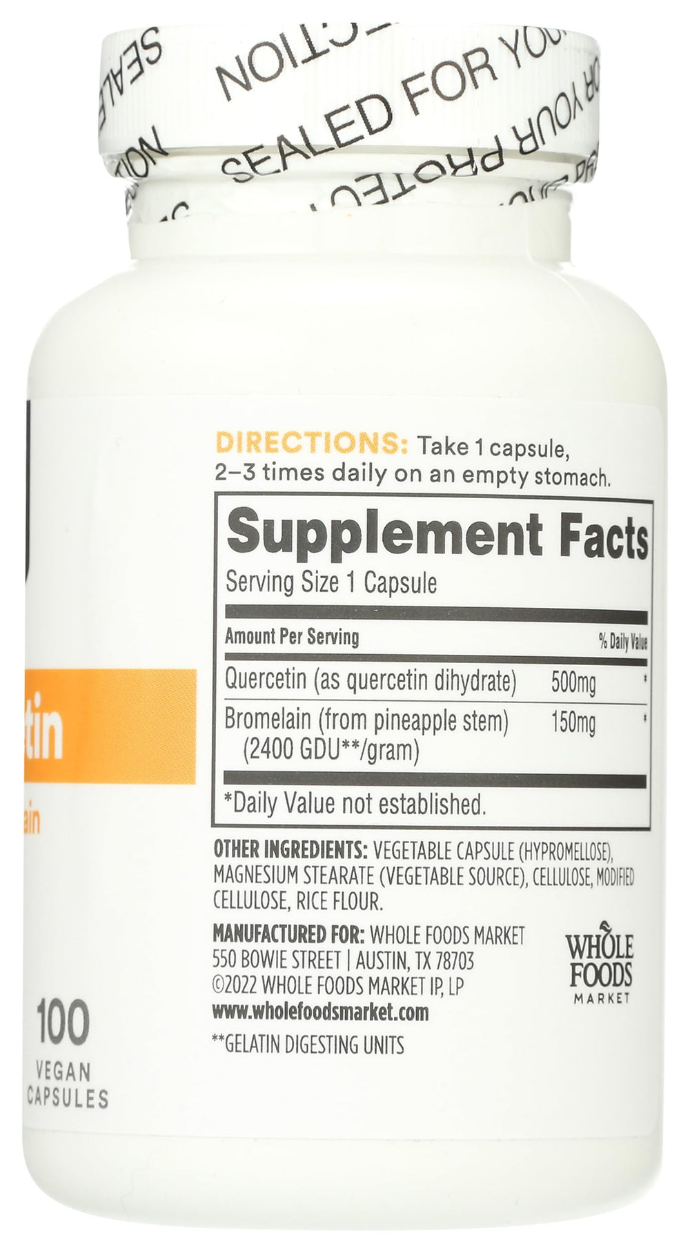 Bottle on shelf featuring Whole Foods Market supplement line