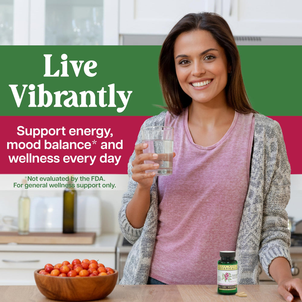 Whole World Botanicals Royal Camu Dark bottle with spoon for daily use.