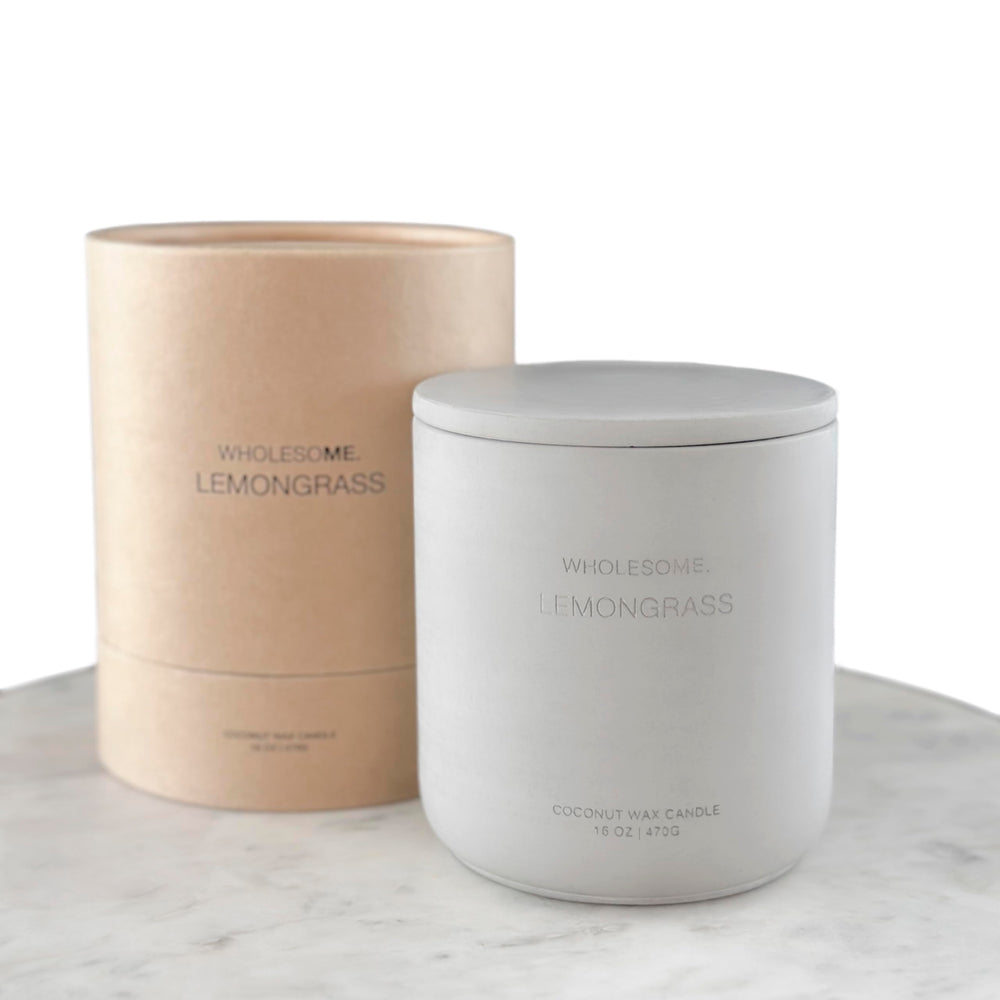 WHOLESOME Lemongrass candle in a concrete jar for a calming home atmosphere.