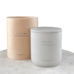 WHOLESOME Lemongrass candle in a concrete jar for a calming home atmosphere.