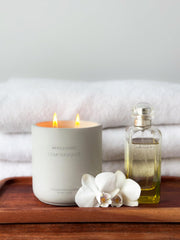WHOLESOME Lemongrass candle lit for cozy evenings and spa-like calm.