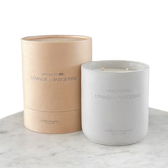 WHOLESOME Orange Tangerine candle in concrete jar closeup highlighting clean burn and scent