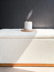WHOLESOME Eco-packaging of Warm Woods candle with reusable lid and sustainable materials.