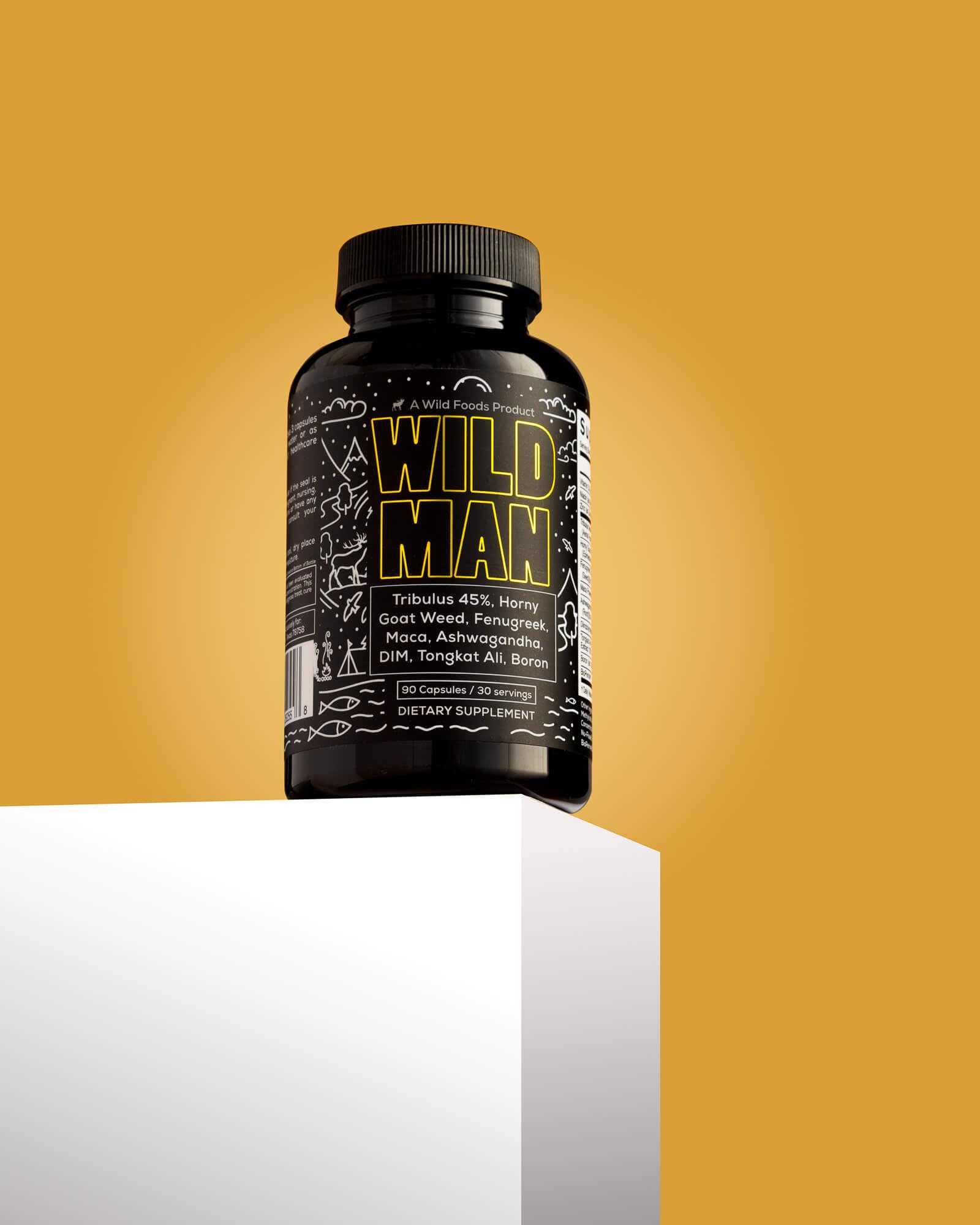 Wild Foods Herbal Stack for Man pouring a capsule from bottle