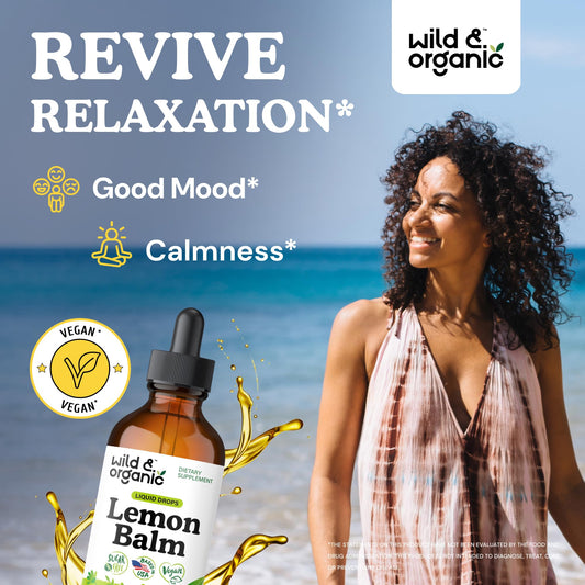 Wild & Organic lemon balm tincture dropper releasing calming drops