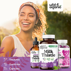 Wild & Organic milk thistle capsules being poured from bottle.
