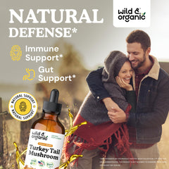 Dropper releasing turkey tail tincture from Wild & Organic bottle for daily use.