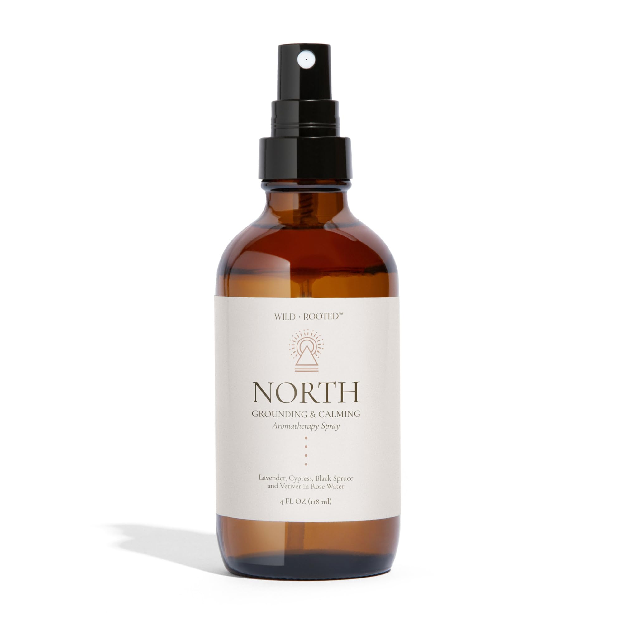 Wild + Rooted North aromatherapy spray bottle pour for immediate calm.