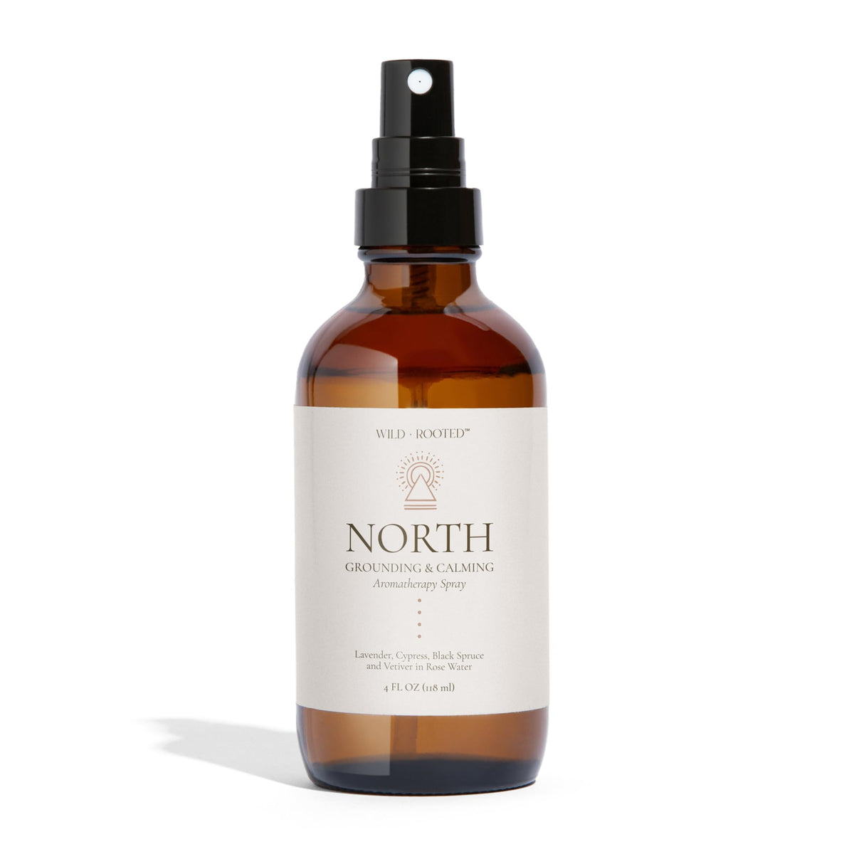 Wild + Rooted North aromatherapy spray bottle pour for immediate calm.