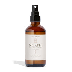 Wild + Rooted North aromatherapy spray bottle pour for immediate calm.