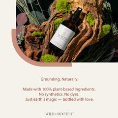 Wild + Rooted North pillow spray applied for restful grounding at night.