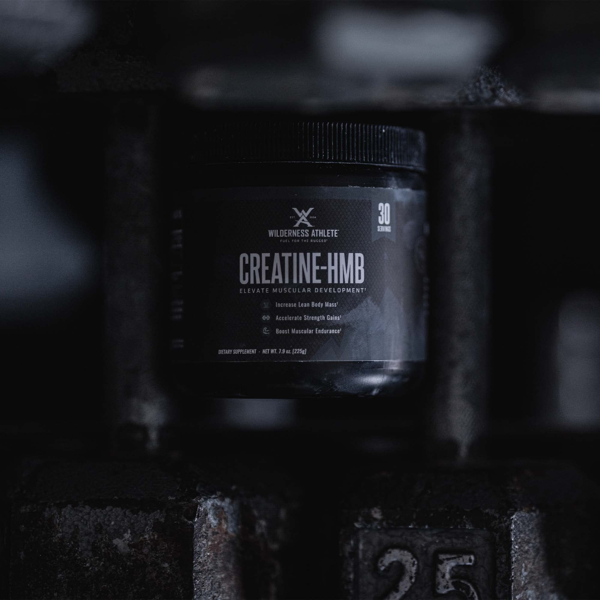 Wilderness Athlete Creatine HMB powder closeup highlights fine micronized texture.