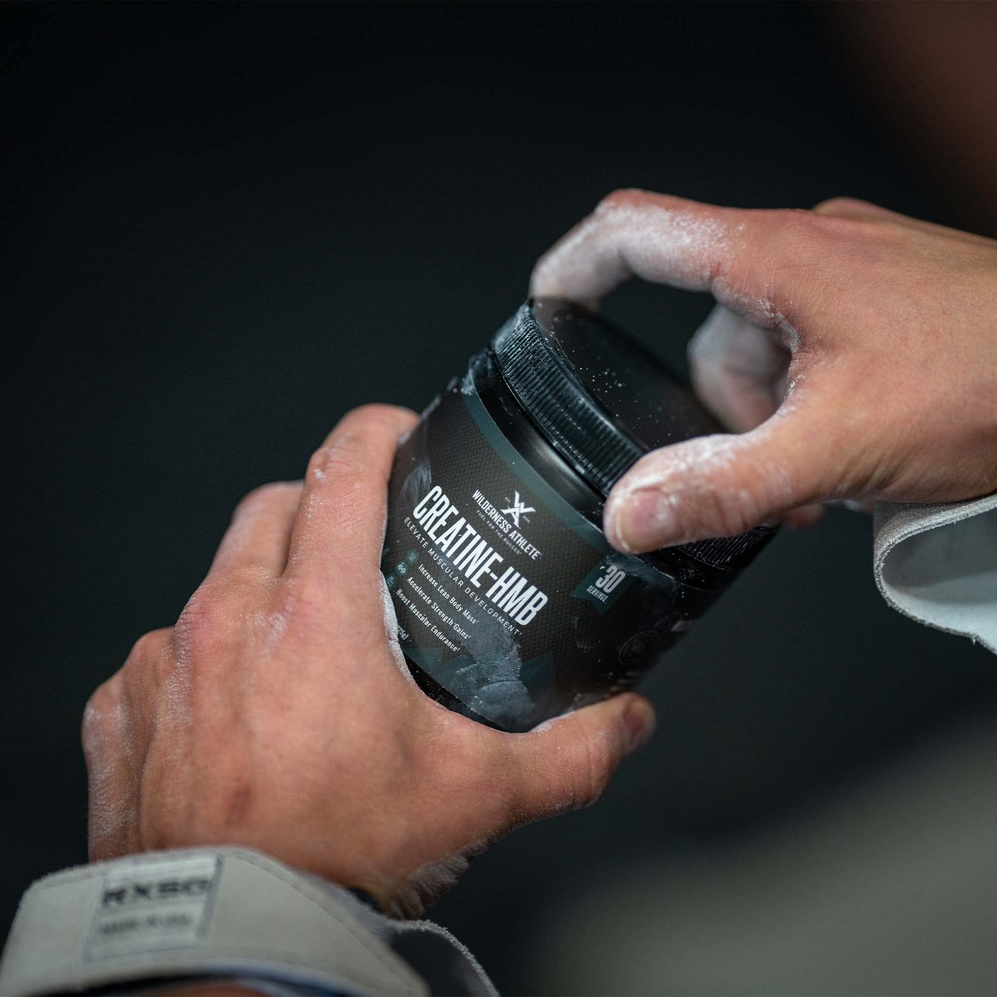 Wilderness Athlete Creatine HMB powder scoop: easy dosing for workouts.