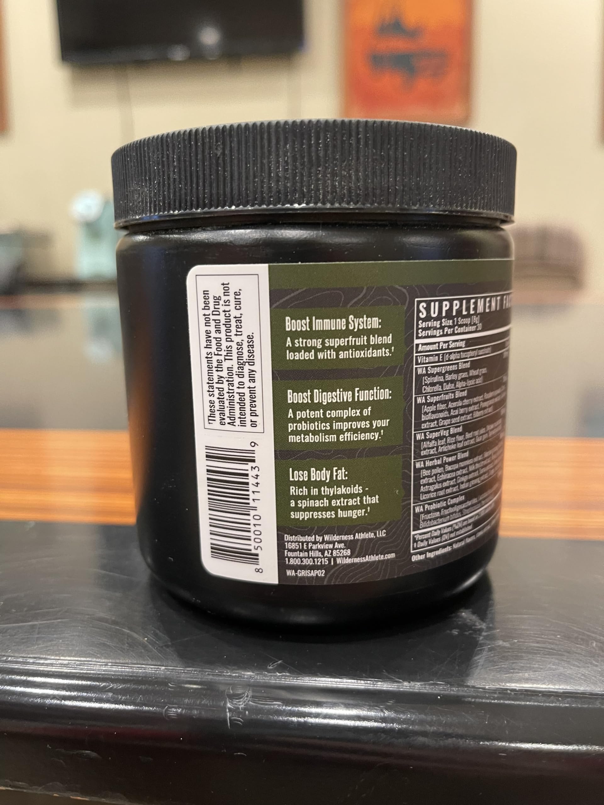 Wilderness Athlete Green Infusion ingredients-spread highlights leafy greens and adaptogens in the blend.