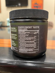 Wilderness Athlete Green Infusion serving-spoon demonstrates portion guidance for daily use.