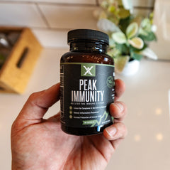 Wilderness Athlete Peak Immunity capsules close-up for convenient daily use.