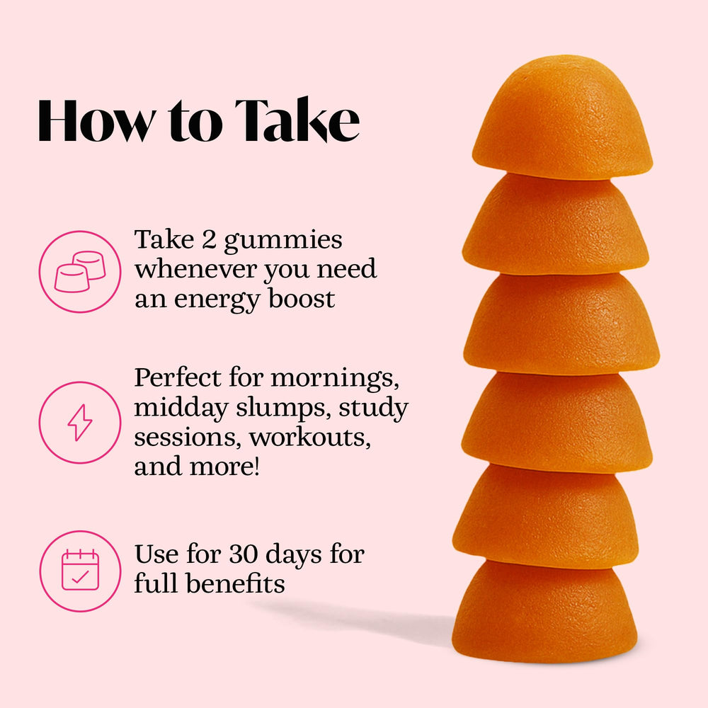 Winged Wellness Rise Up gummies beside a laptop for focused work