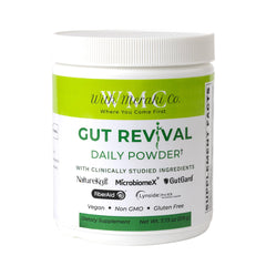With Meraki Co. Gut Revival bottle closeup for supporting microbiome balance and digestive wellness.