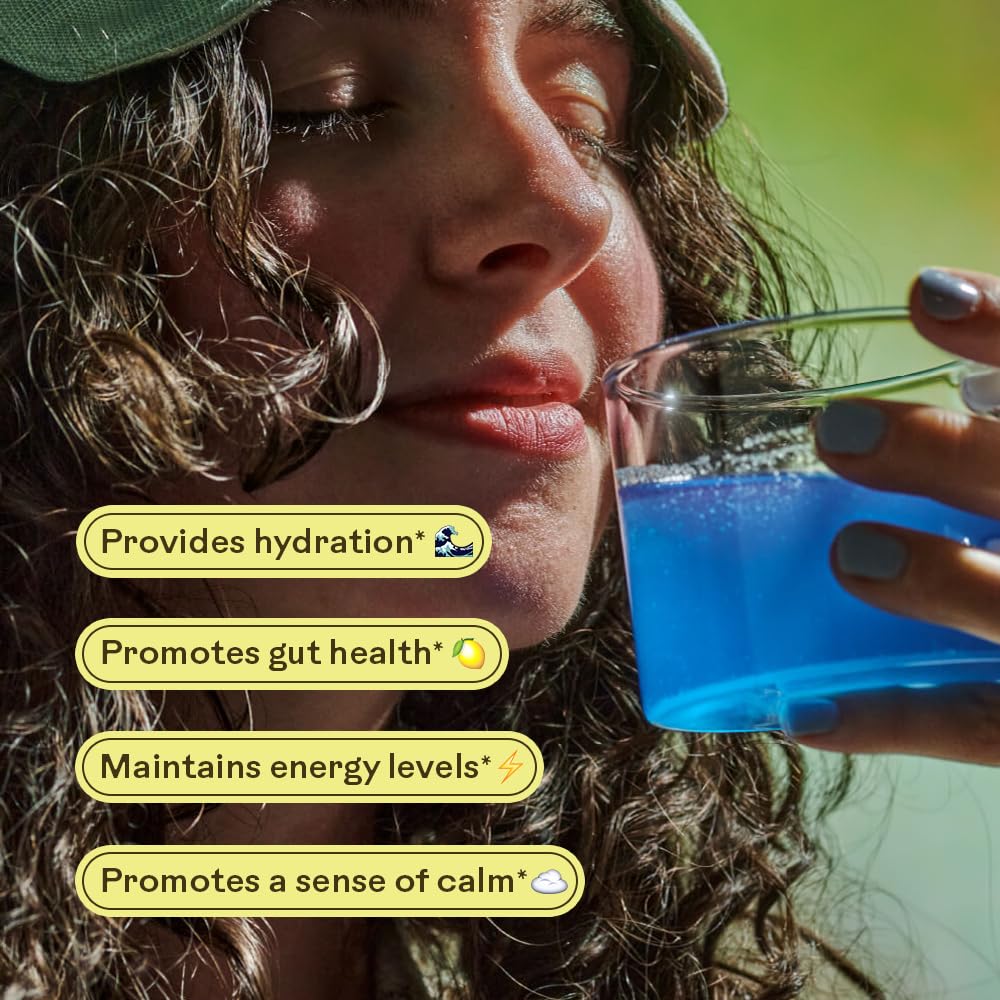 Wooden Spoon Herbs Magic Magnesium Citrate blue lemonade dissolving in water for hydration