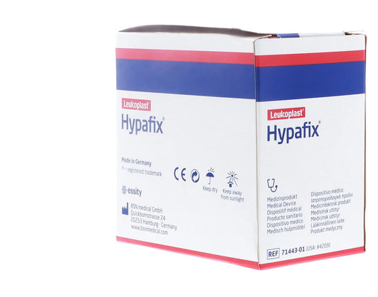 Hypafix tape being applied to gauze for easy dressing placement