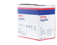 Hypafix tape being applied to gauze for easy dressing placement