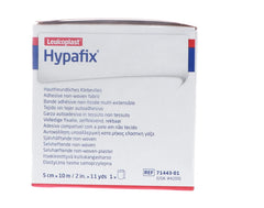 Wound Care Hypafix being cut for secure fit