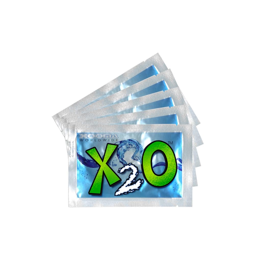 Xooma X2O mineral bags dissolving in water for mineral-rich hydration.