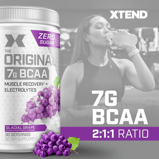 Xtend Original being poured, sugar-free BCAA powder for training sessions.