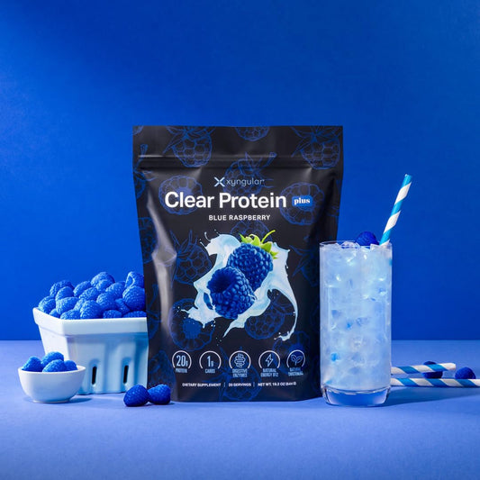 Xyngular Clear Protein Blue Raspberry bag side angle showing portable flavor option.
