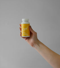 Morning routine scene featuring Xyngular Xyng Energy capsules.