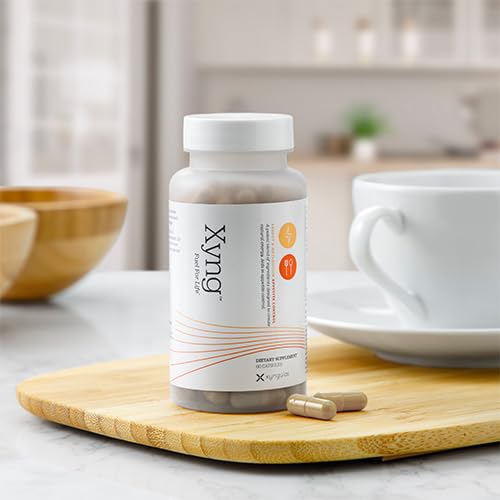 Xyngular Xyng Energy label close-up highlighting 5-HTP and caffeine.