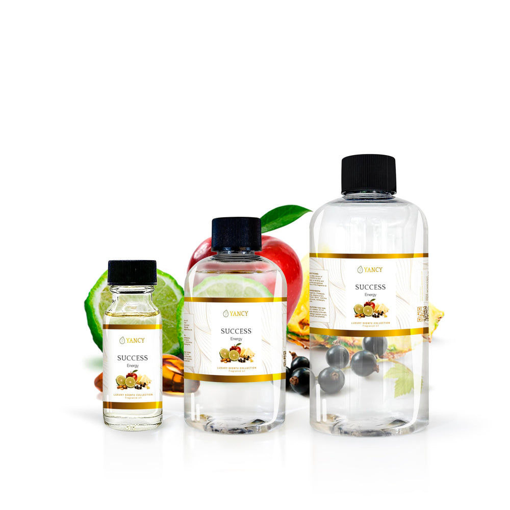 YANCY Success fragrance oil bottle beside an aroma lamp for mood uplift
