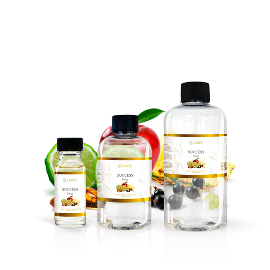 YANCY Success fragrance oil bottle beside an aroma lamp for mood uplift
