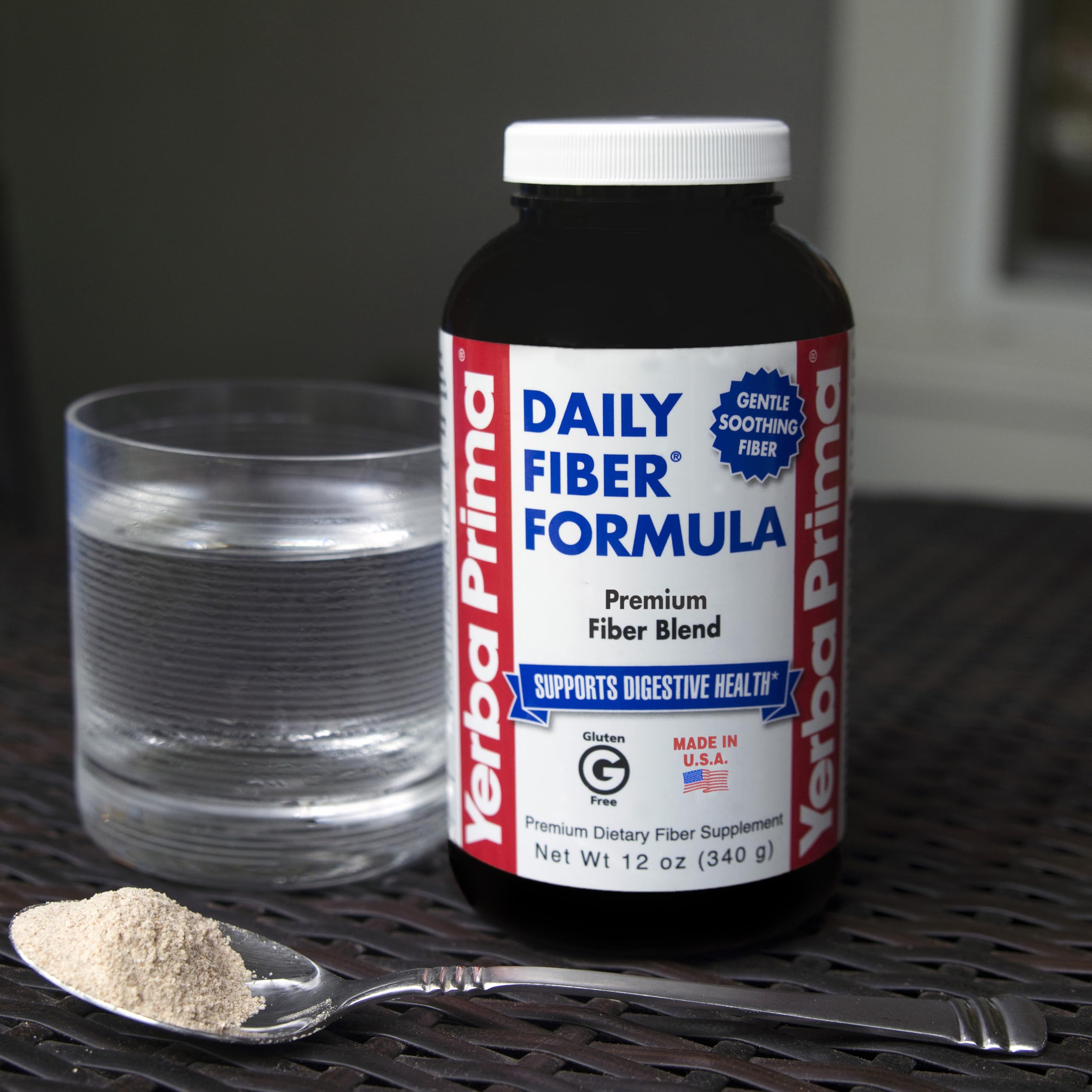 Pouring Yerba Prima Daily Fiber Formula into a glass for a fiber-rich drink.