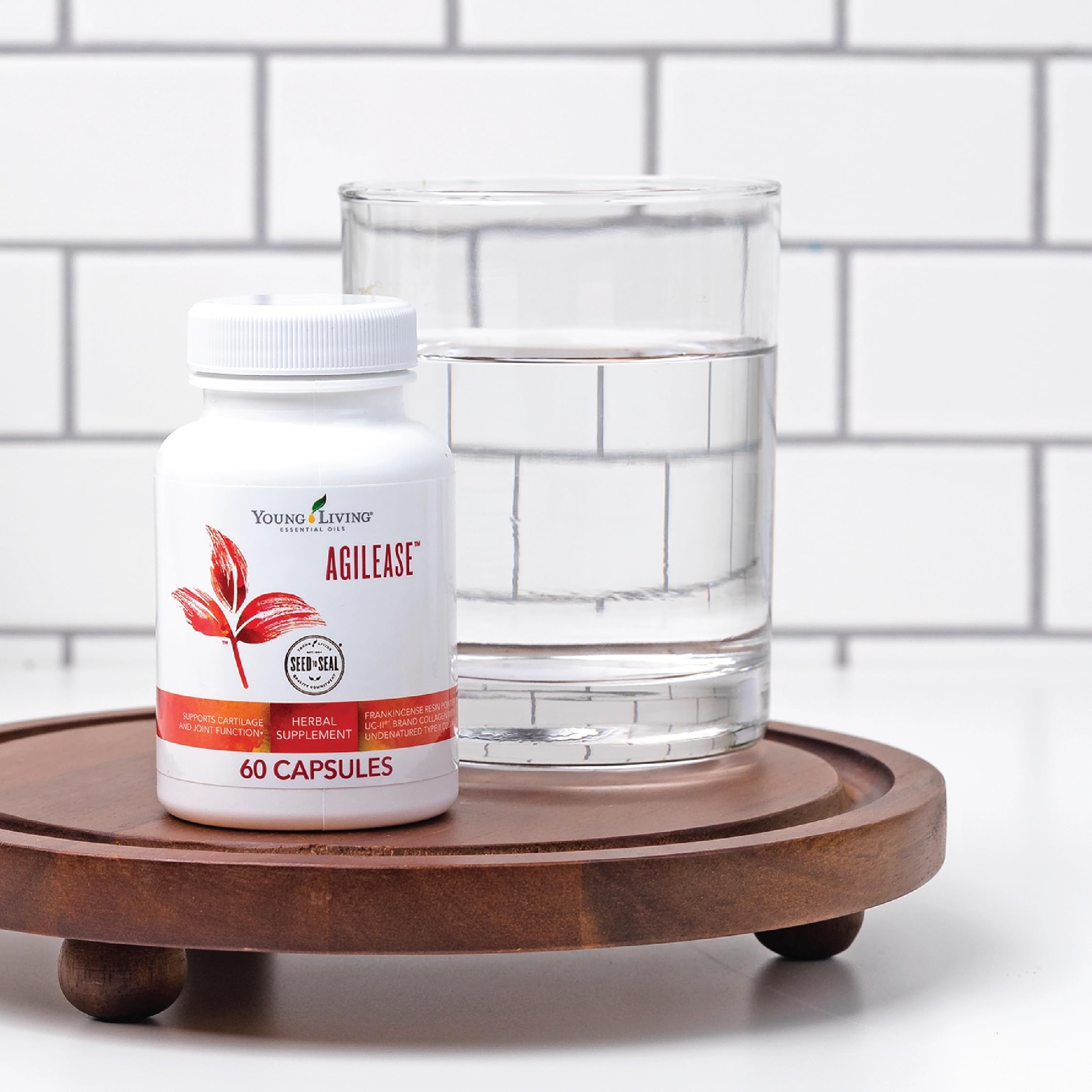 Young Living AgilEase box beside water illustrating simple intake