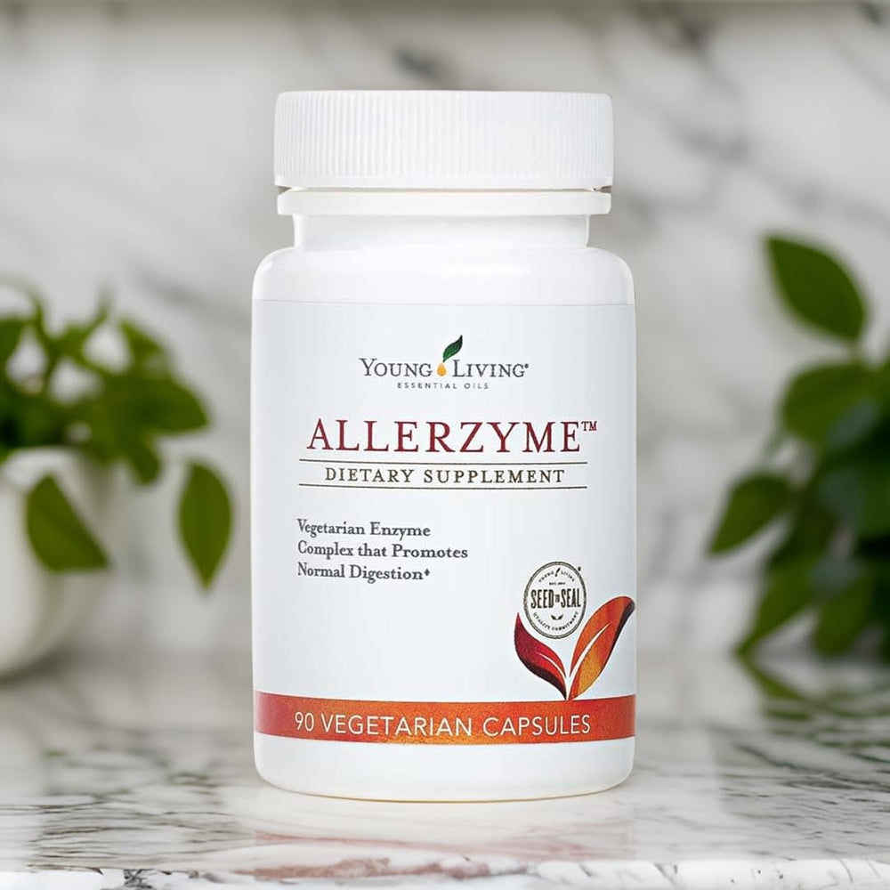 Young Living Allerzyme capsules closeup showing plant-based enzymes for post-meal comfort.