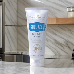 Application scene of Young Living Cool Azul on skin.