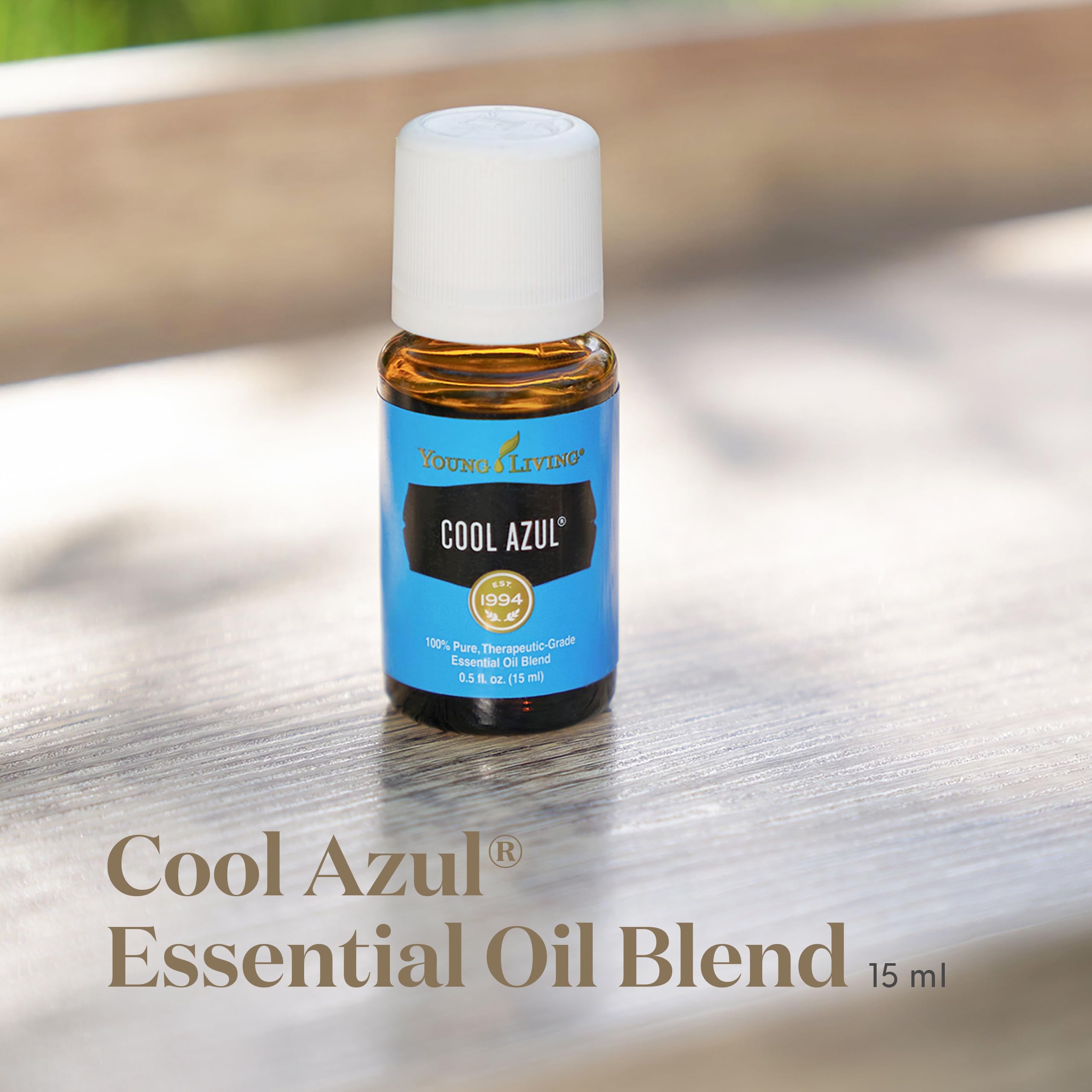 Clean-label packaging display for Young Living Cool Azul essential oil.