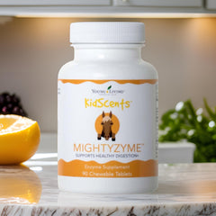 Young Living KidScents MightyZyme bottle indicates natural digestive support for children.