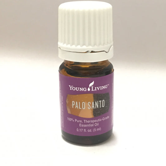Closeup of Palo Santo wood notes from Young Living oil highlighting authentic aroma for meditation.