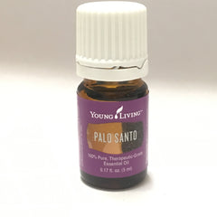Closeup of Palo Santo wood notes from Young Living oil highlighting authentic aroma for meditation.